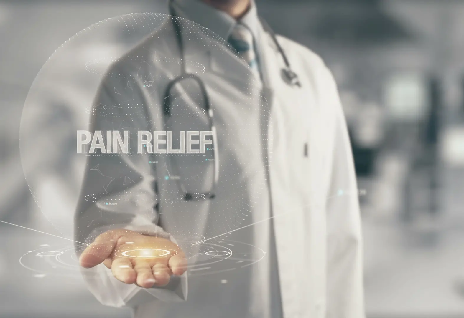 A pain specialist holds out his hand holding an orb with the words pain relief in the center.