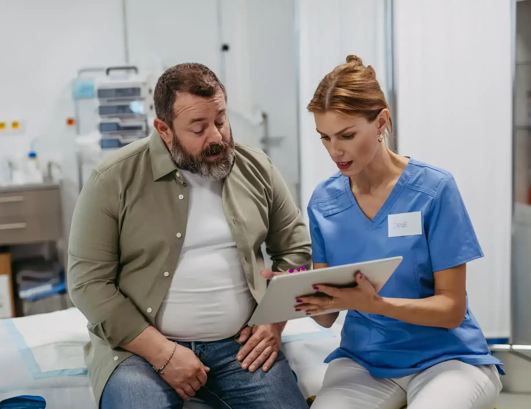 The doctor is explaining the diabetes report to her patient